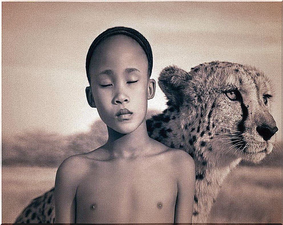 Fragile child with tiger