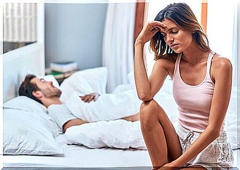 Couple representing going to bed angry or worried
