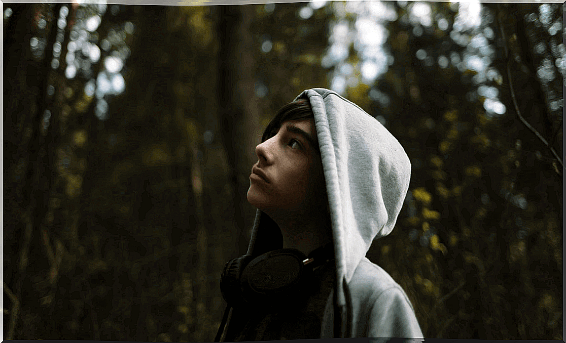 Teen boy in the woods