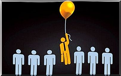 Man with balloon trying to fit in