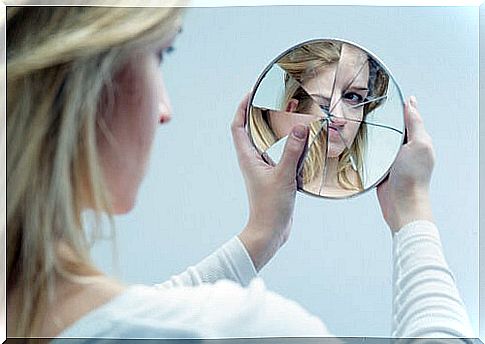 Woman looking in the mirror