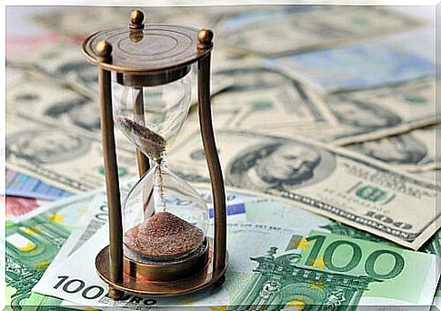 Hourglass over money
