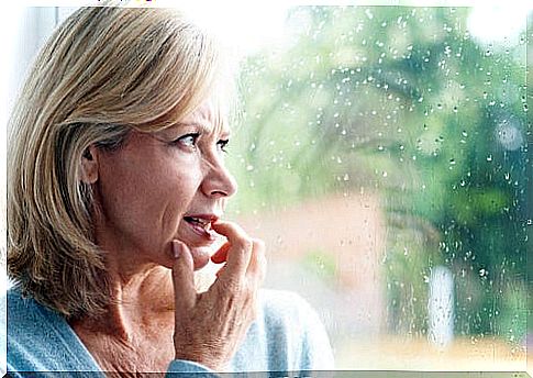 Woman with phobia looking out the window