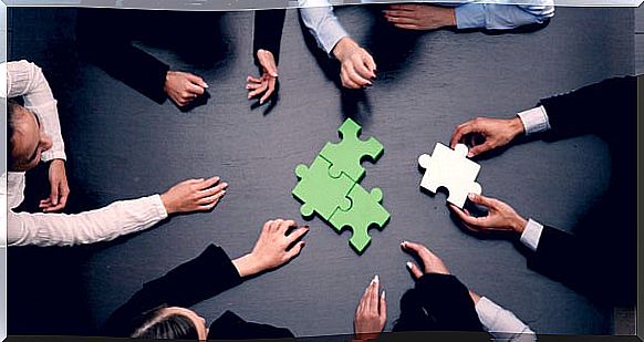 Group of people with a puzzle