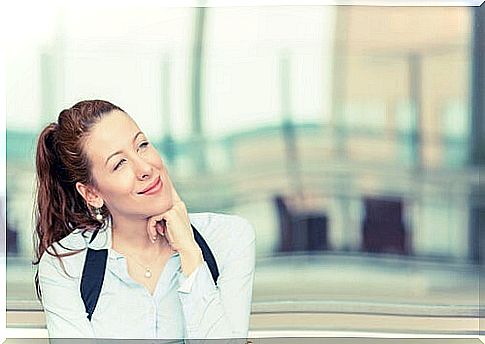 Woman thinking smiling