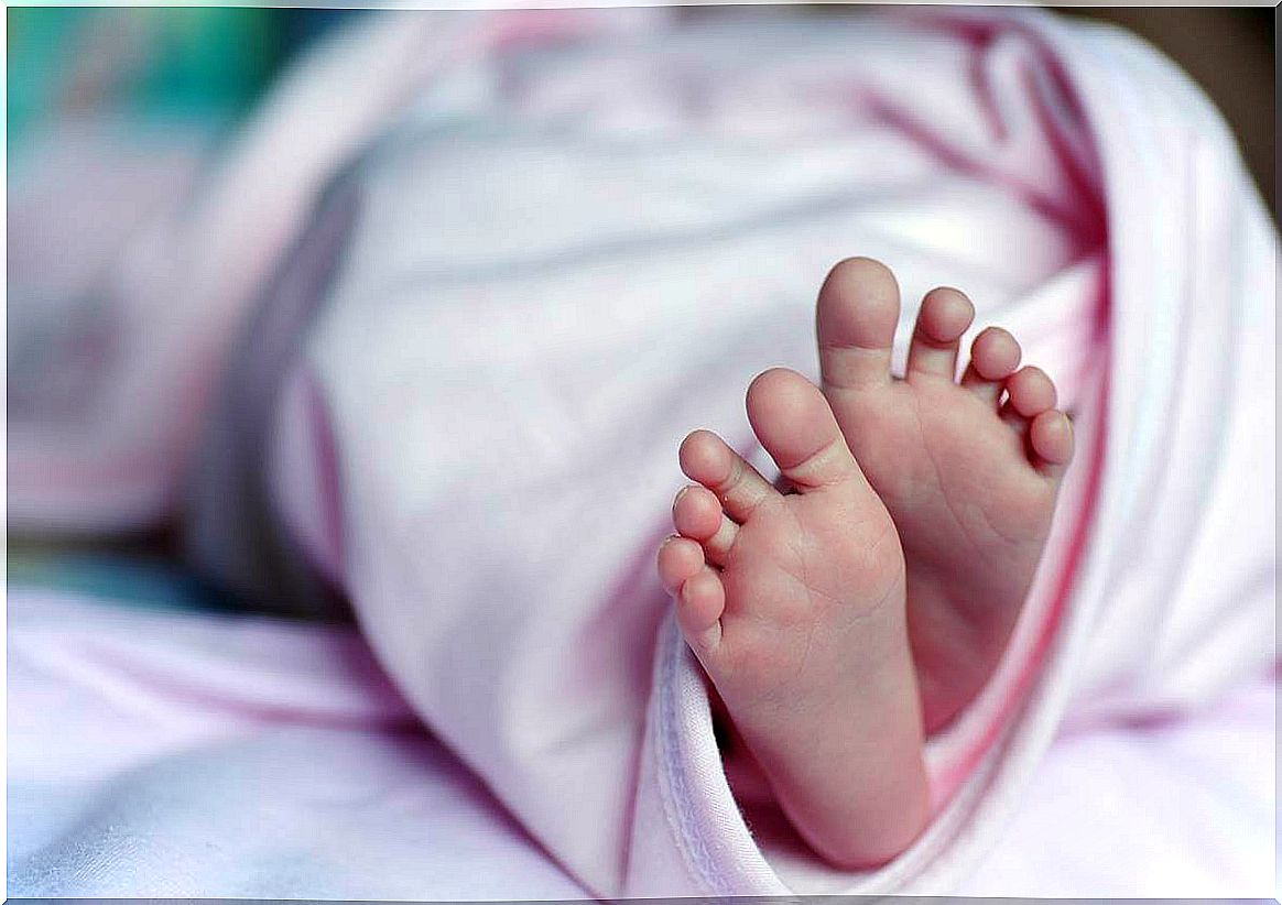 baby feet representing the short blanket dilemma